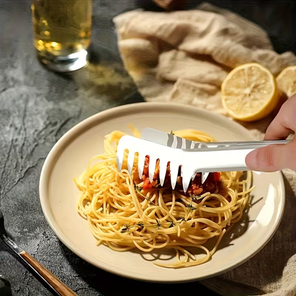 Stainless steel pasta tongs, suitable for buffets and family meals.